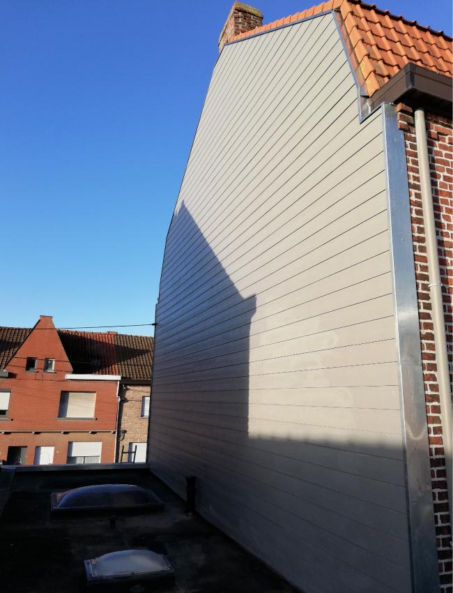 Bardage gris sur façade au bizet
