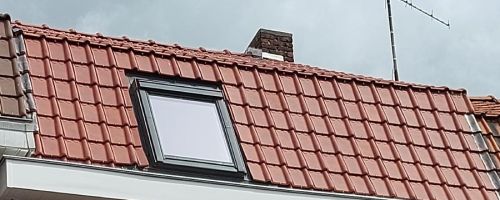 Vu d'une toiture en tuile rouge rénové sur Nieppe