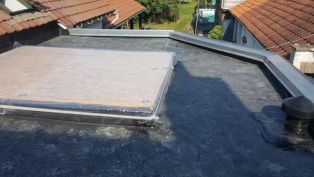 Toiture plate renové sur comine
