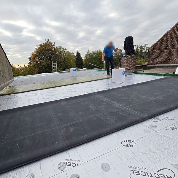 Rénovation complète d’une toiture plate à Comines-Warneton