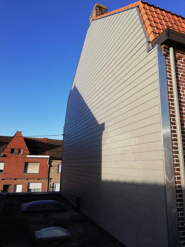 Isolation De Pignon En Bardage De Fibre De Ciment A Wervicq Sud après
